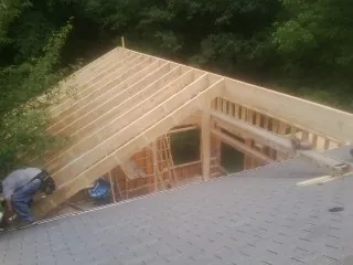Framing a new roof addition that ties into an existing shingle roof in Swaledale